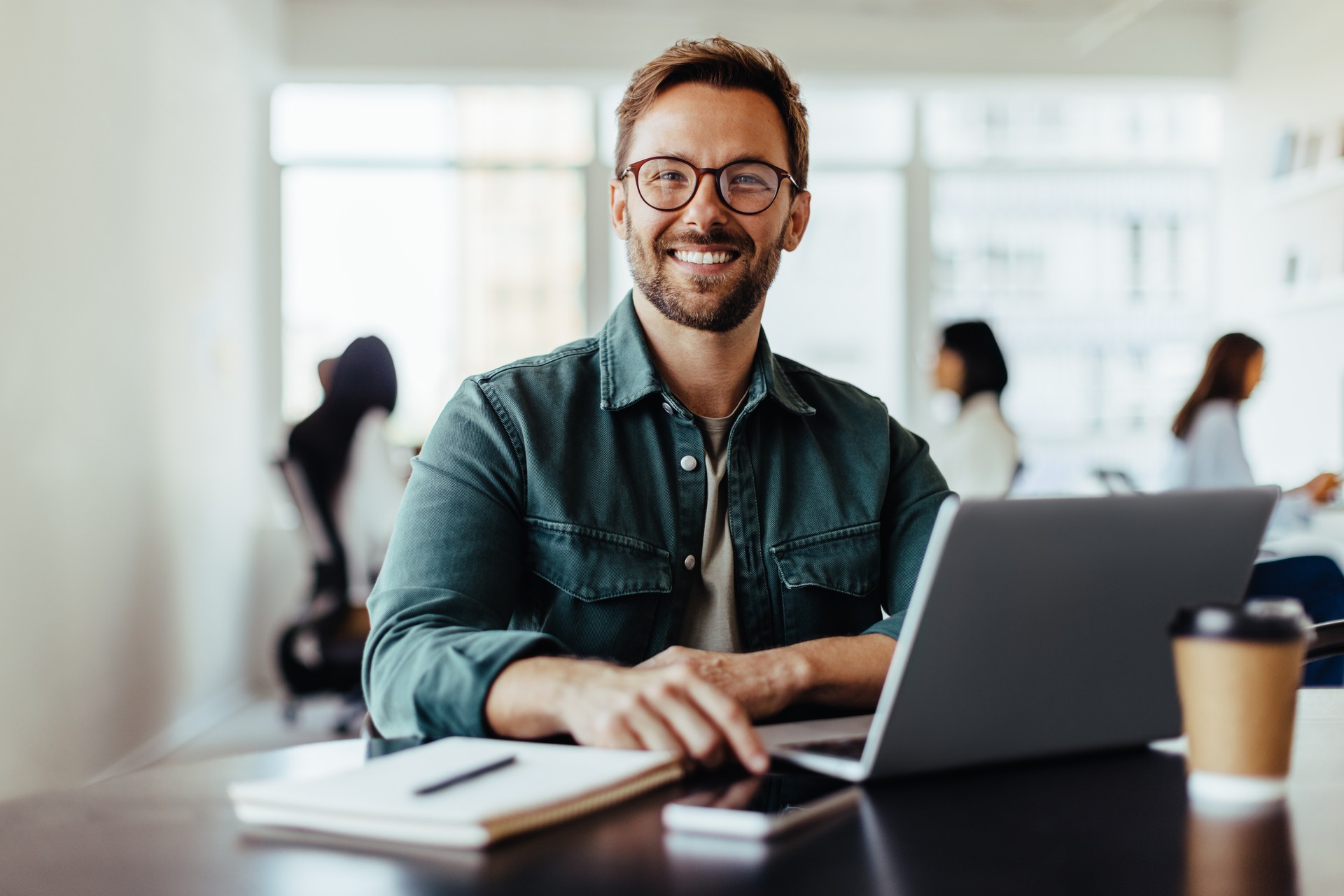 Portrait of a business man sitting in an office